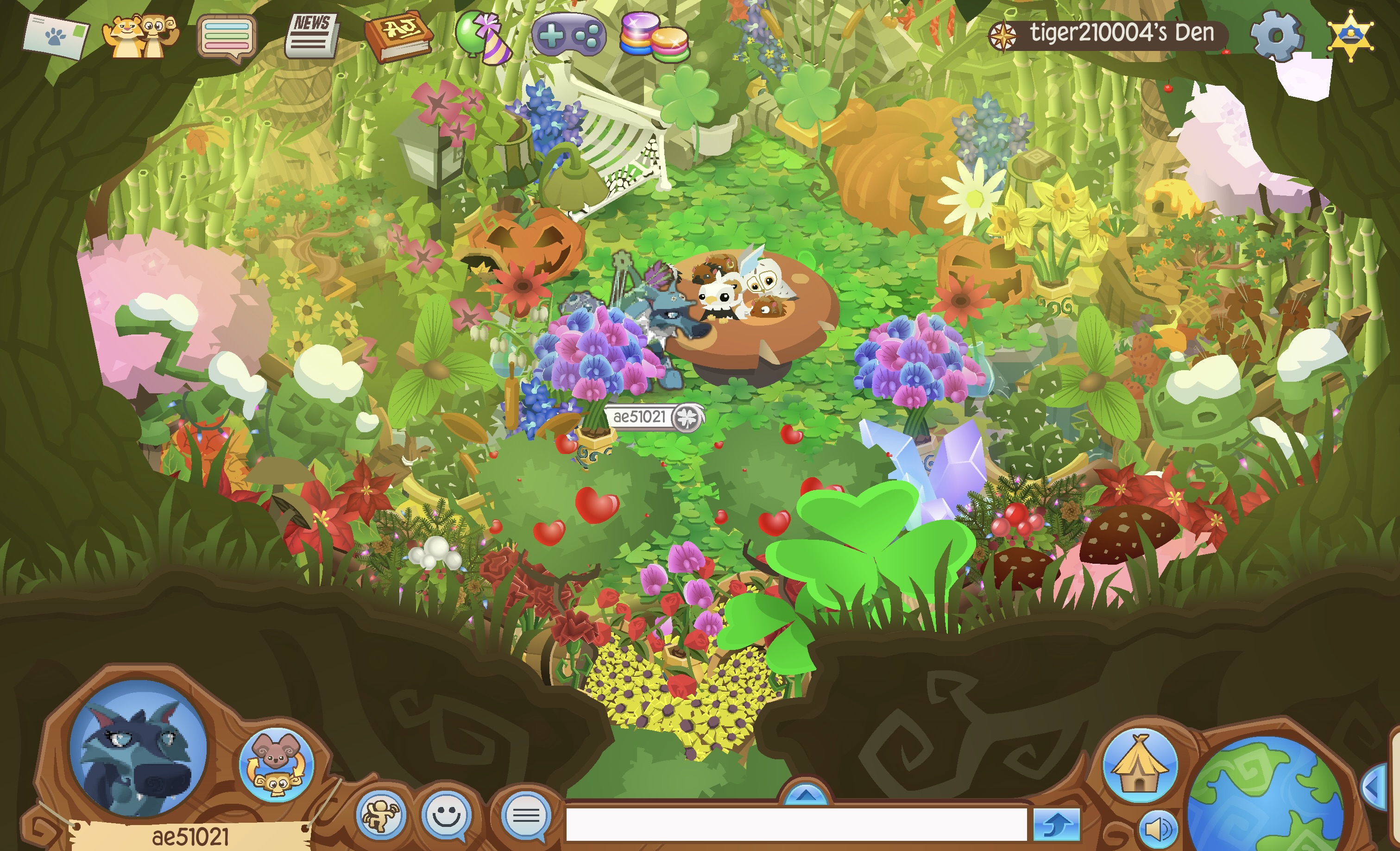 An Animal Jam wolf in an Enchanted Hollow den. ae51021 is the user and she is surrounded by lots of different nature-themed items. To her close right is a mushroom table with various pets on it, acting as a prey pile. Above her are thrones, a skeleton and a pumpkin one, respectively. Below her is a tunnel to the rest of the den, which serves as ThornClan's camp. It is tiger210004's den.